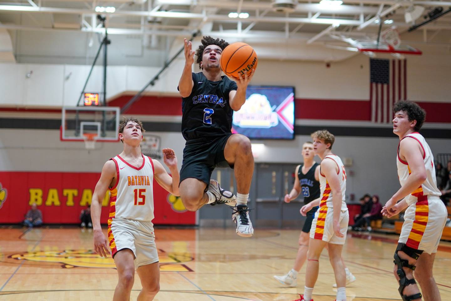 Burlington Central's Caden West (2) drives to the basket against Batavia’s Dane Farrar (15) during a Batavia Night of Hoops Basketball game at Batavia High School on Saturday, Jan. 25, 2025.