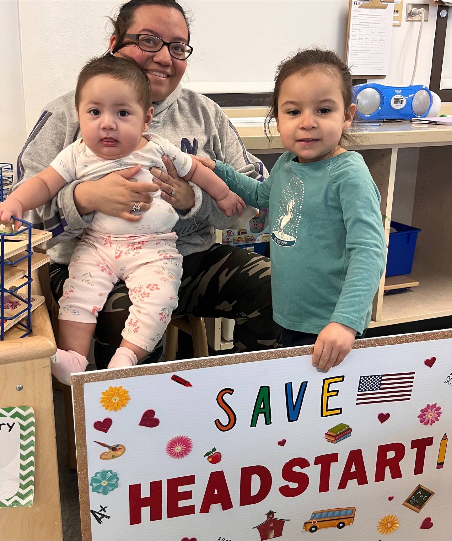 Maritza Cisneros is pictured with her daughters Adelyn Sanchez (left) and her sister Aurora Cisneros) in support of Will County’s Head Start program.