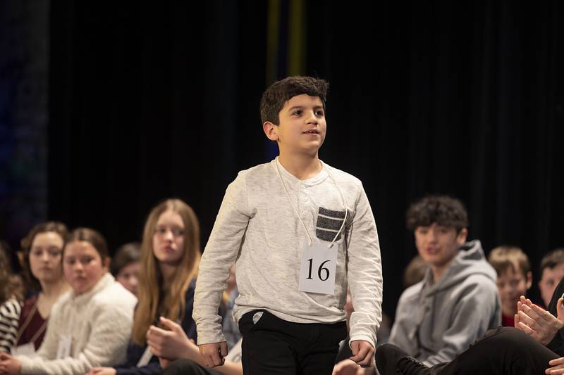 Washington Elementary School fifth grader Carter Davis appears on stage Thursday, March 9, 2023 during the Lee-Ogle-Whiteside Regional Spelling Bee.