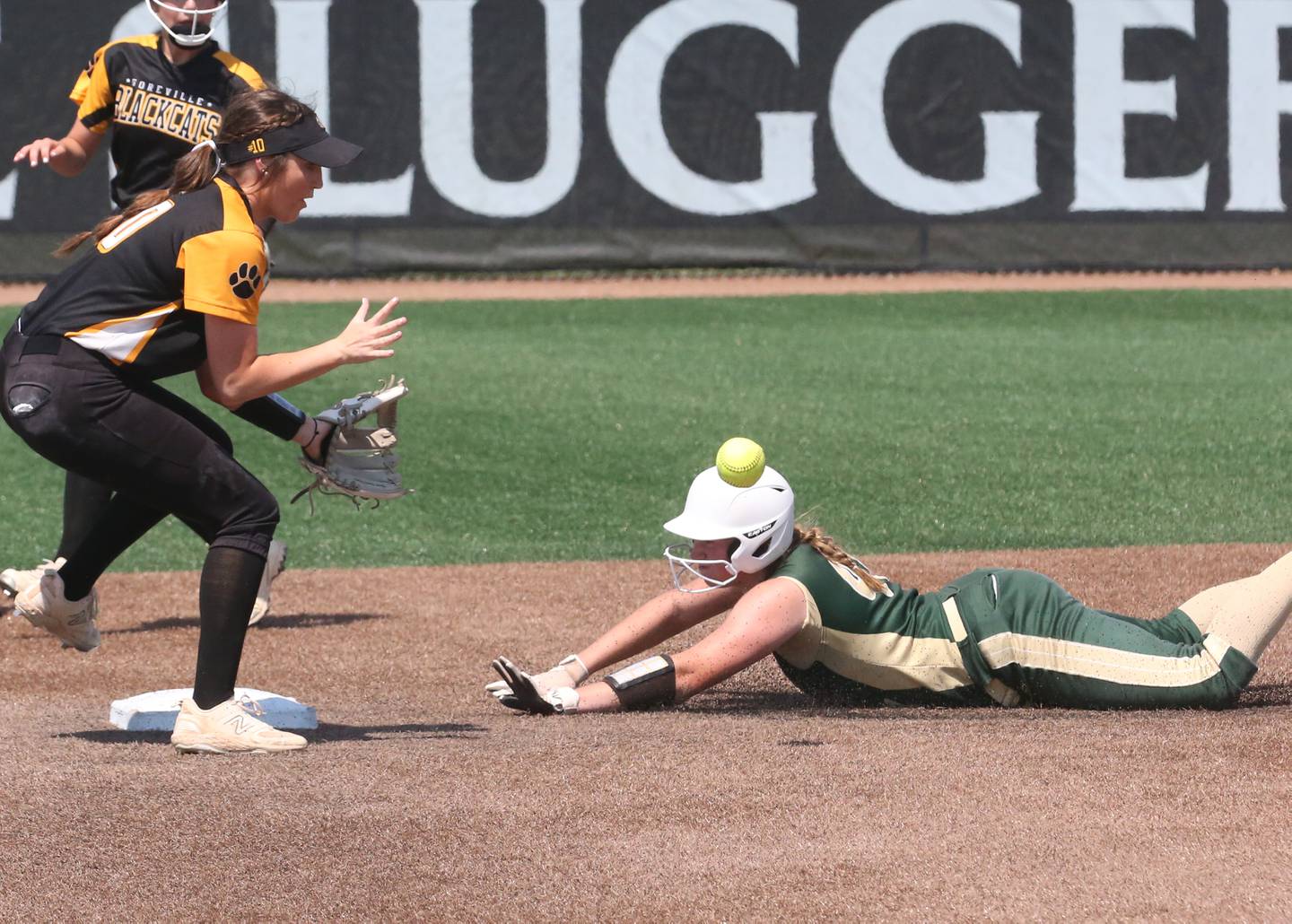 St. Bede's Reagan Stoudt slides into second base safely while Goreville's Brea Suits waits for the late throw in the Class 1A State semifinal game on Friday, June 2, 2023 at the Louisville Slugger Sports Complex in Peoria.