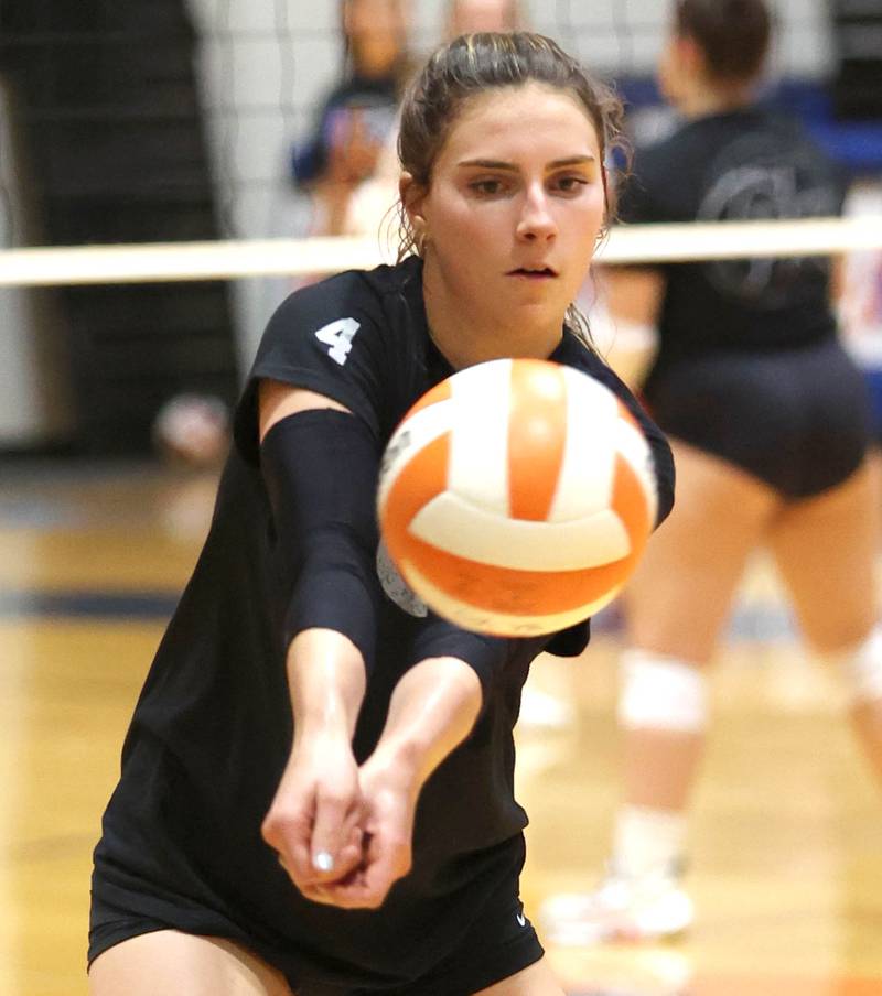 Genoa-Kingston's Hannah Langton bumps a ball Tuesday, Aug. 23, 2022, during volleyball practice at the school in Genoa.