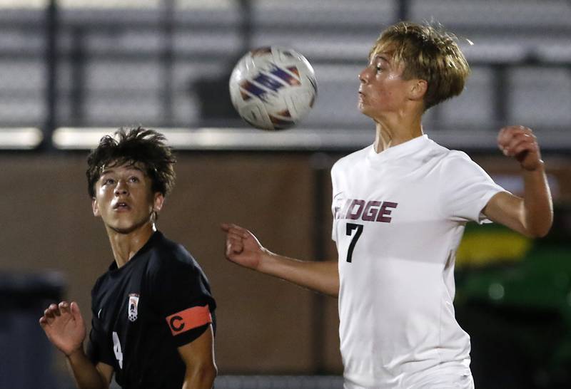 Prairie Ridge's Alex Zinevich controls the ball in front of McHenry's Cole Tapia during a Fox Valley Conference boys soccer match on Tuesday, Sept. 30, 2025, at McCracken Field in McHenry.