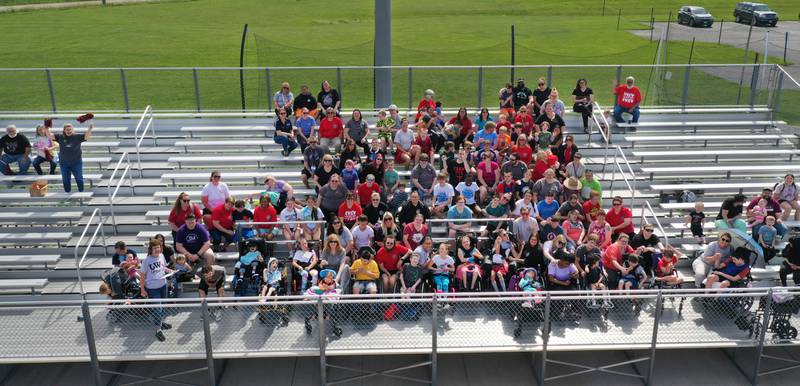 Lighted Way staff, students and Trinity Catholic Academy PALS pose for a photo during the Spring Track Meet on Monday, May 13, 2024 at the L-P Athletic Complex in La Salle. Lighted way students participated in running, throwing, wheelchair slalom and much more.