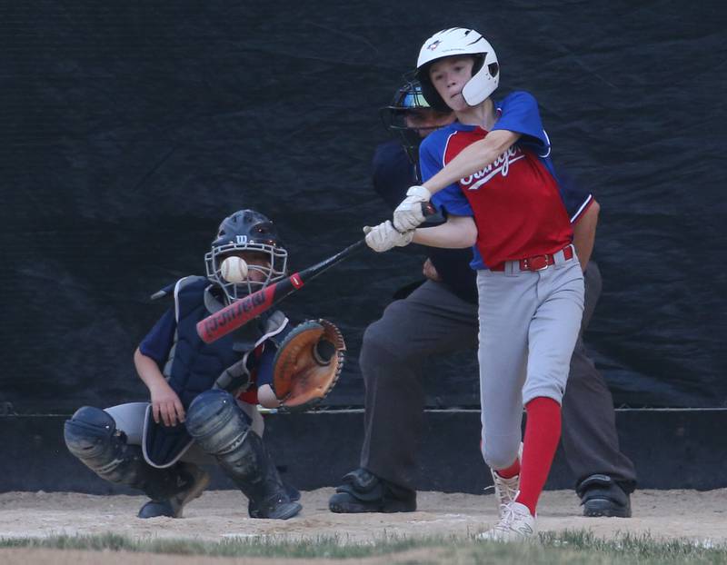 Frostbyte MSP Rangers Mason Mucci smacks a solo home run during the Ottawa Little League baseball (12U) City Championship on Friday, June 23, 2023 at Varland Park in Ottawa.