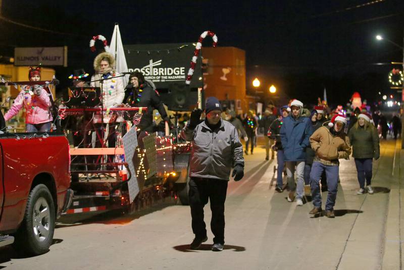 The Crossbridge Church float rolls down Peoria Street in the Light up the Night parade on Saturday, Dec. 3, 2022 downtown Peru.