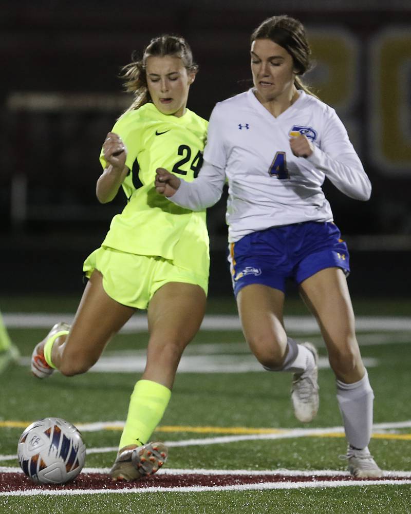 Richmond-Burton's Ember Demers battles with Johnsburg's Ava Jablonski for the ball during Kishwaukee River Conference Girls Soccer  Tournament Championship Match Wednesday, May 3, 2023, at Richmond-Burton High School.
