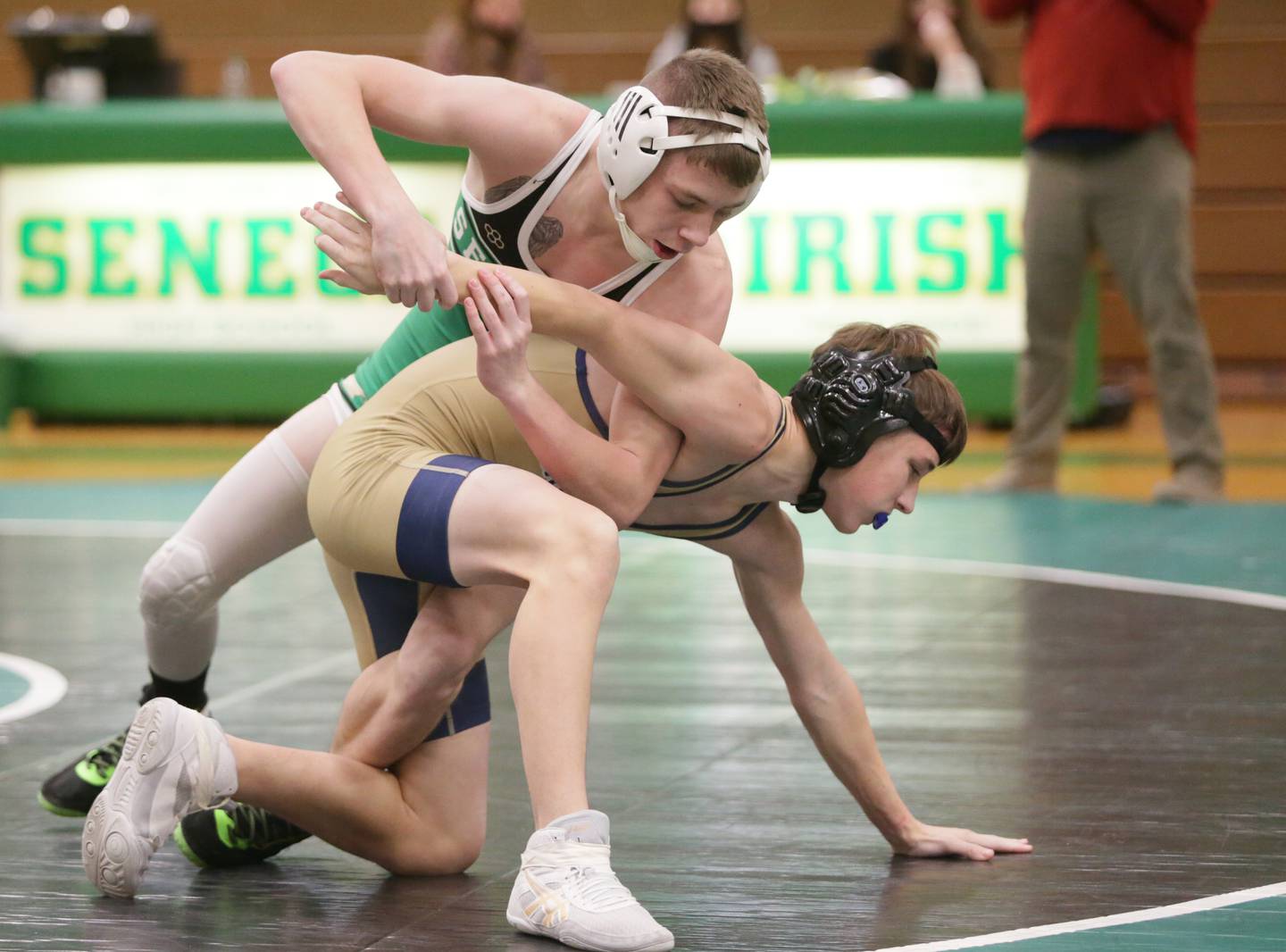 Seneca's Jaden Casey works on his Marquette counterpart in the 126-pound weight class during a triangular wrestling meet on Wednesday, Jan. 12, 2022, in Seneca.