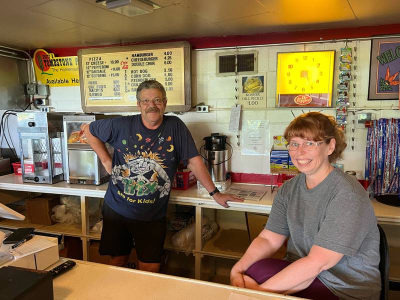 New Earlville Drive-In owners Paul and Shelley Bottomley pose for a photo in the concession stand.