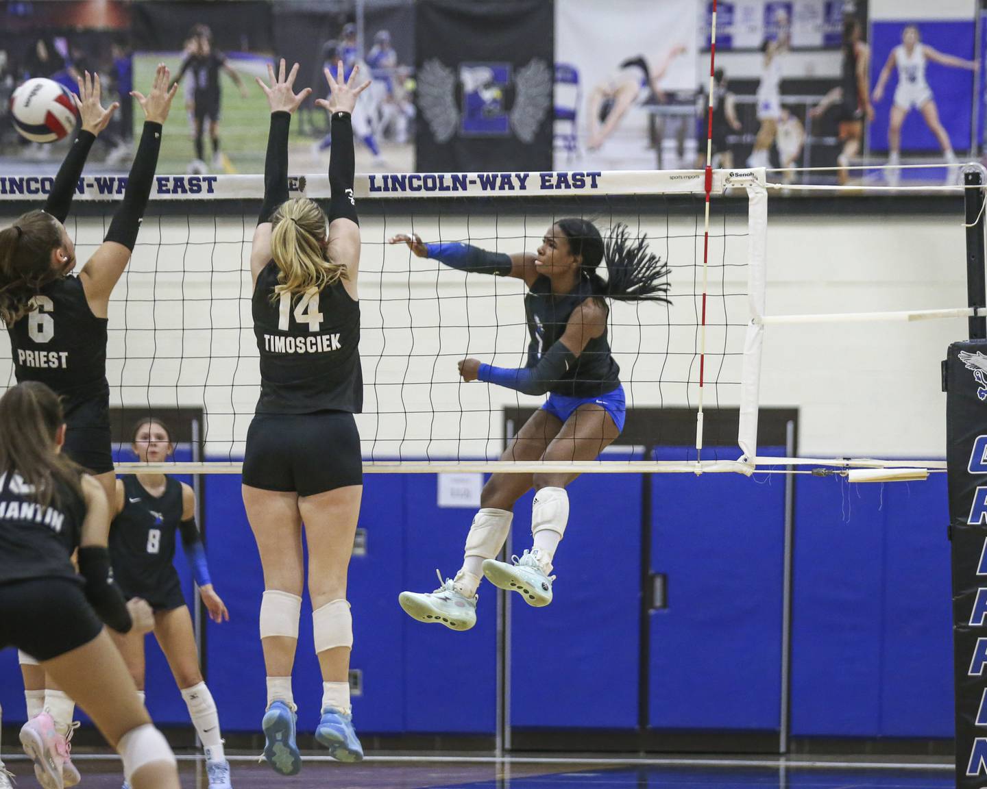 Lincoln-Way East's Kolby Ross (7) with a kill attempt past the defense during volleyball match between Lockport at Lincoln-Way East. Oct 14, 2025.