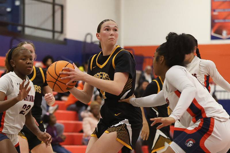 Joliet West’s Ande Carlson looks to pass against Romeoville on Thursday, Jan. 29, 2026 in Romeoville.