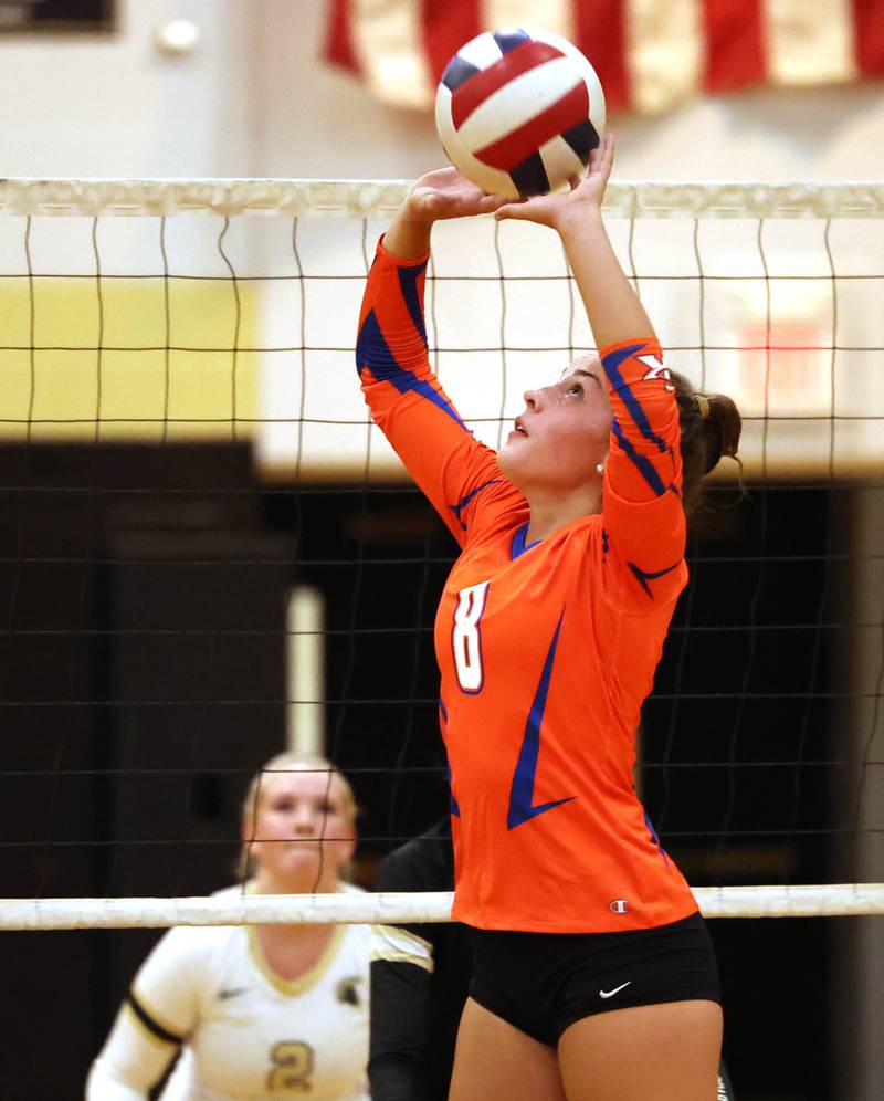 Genoa-Kingston's Alivia Keegan sets the ball during their match against Sycamore Monday, Aug. 28, 2023, at Sycamore High School.