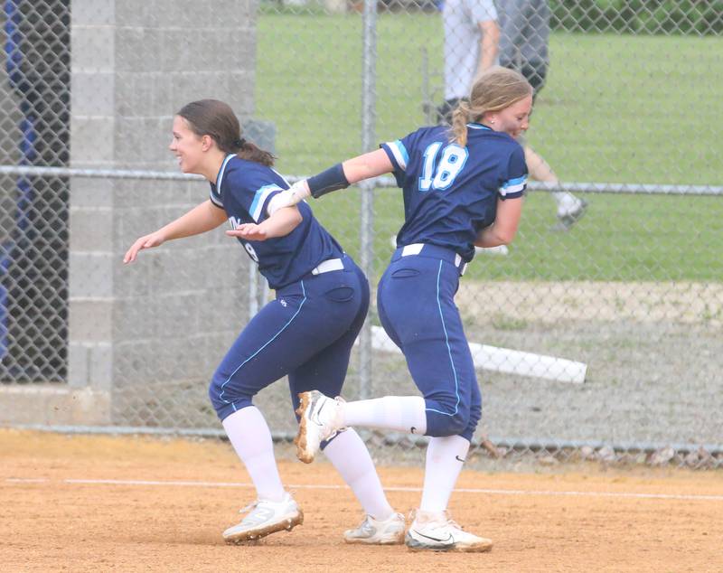 Bureau Valley's Carly Reglin and teammate Kadyn Haage react after defeating Erie-Prophetstown during the Class 1A Regional game on Monday, May 13, 2024 at Bureau Valley High School.