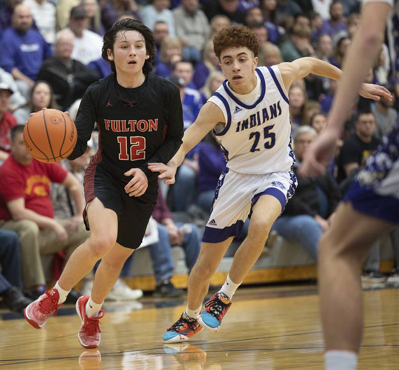 Fulton’s Braeden Brennan handles the ball against Pecatonica’a Joshua Jennings during a class 1A sectional semifinal Wednesday, Feb. 28, 2024 at River Ridge High School.