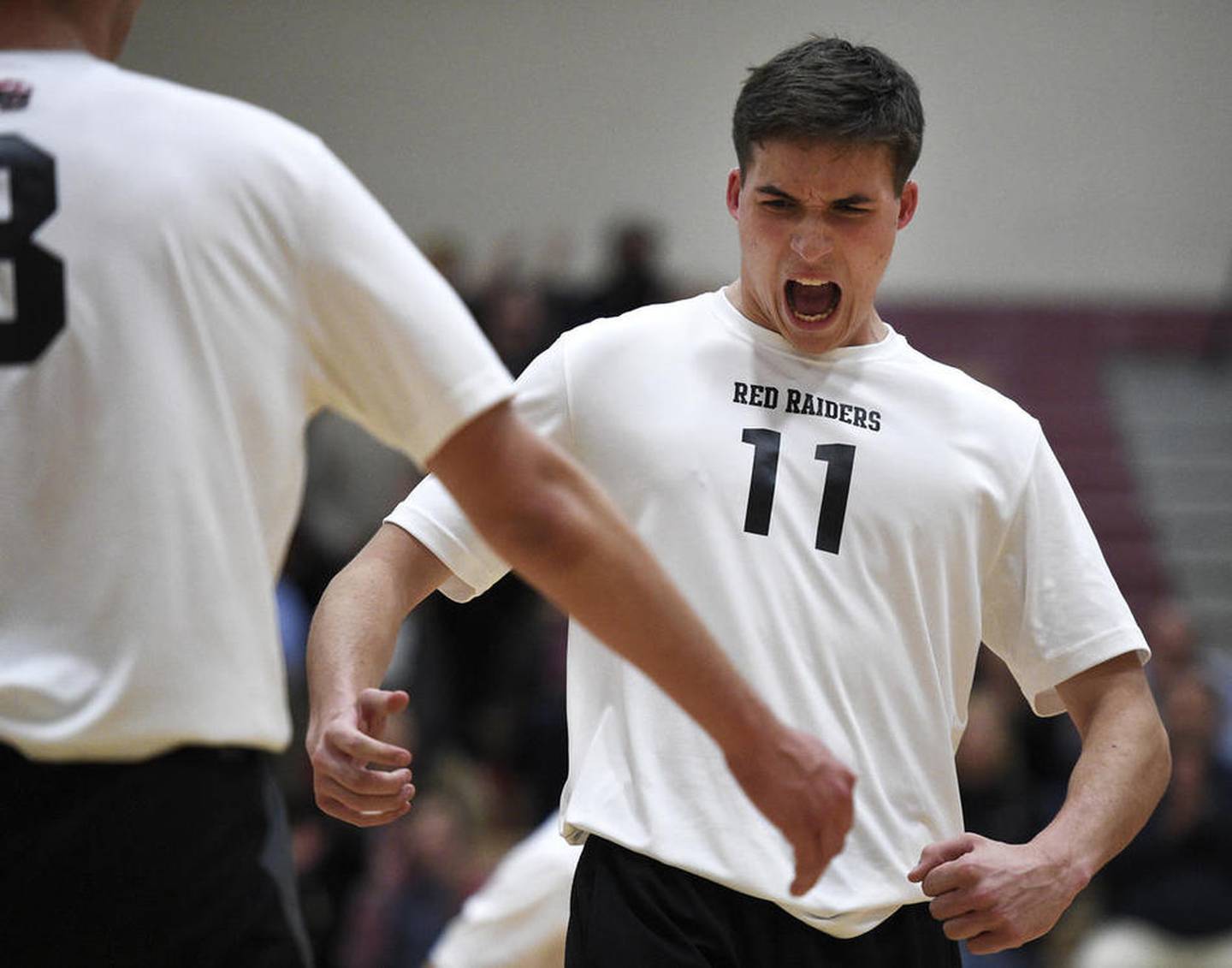 Huntley junior Charlie Johnson celebrates a point Monday, May 1, 2017, during a home match against Harlem.
