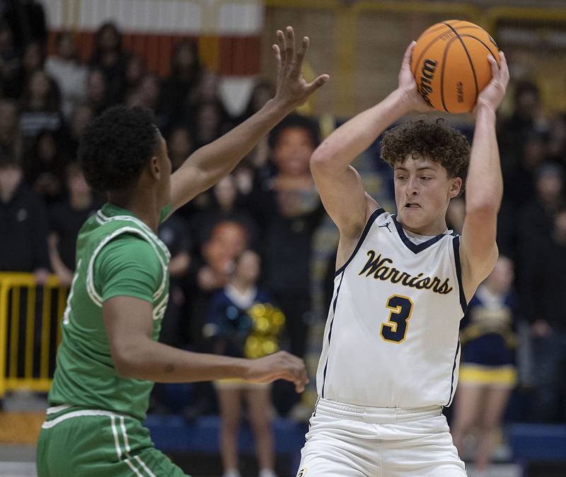 Sterling’s Brady Berlin looks to make a play against Geneseo Friday, Dec. 5, 2025.