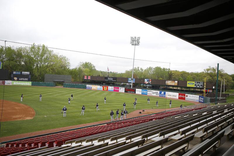 Players practice on the field at Northwestern Medicine Field in Geneva in preparation for the 2021 Kane County Cougars baseball season.