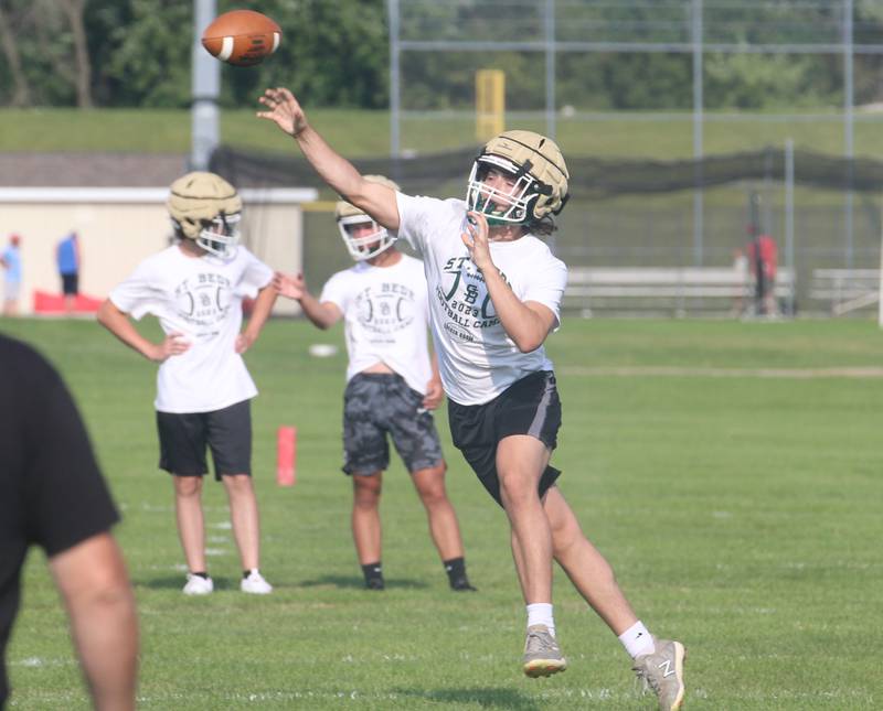 St. Bede quarterback Max Bray throws a pass during a 7-on-7 meet against Ottawa on Monday, July 17, 2023 at Ottawa High School.