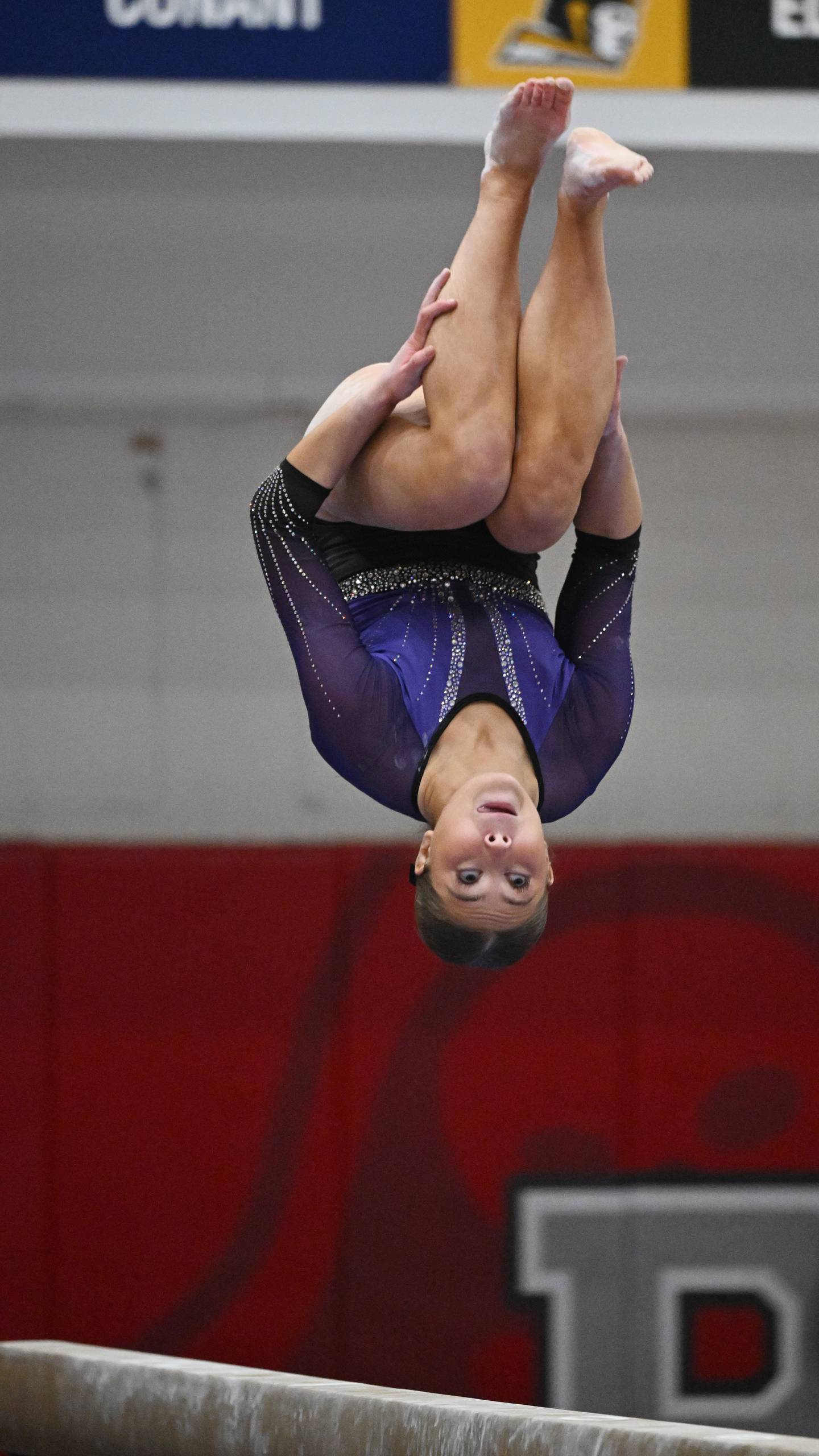 Downers Grove South’s Edith Condon competes on the balance beam during the girls state gymnastics meet at Palatine High School on Saturday, Feb. 21, 2026.