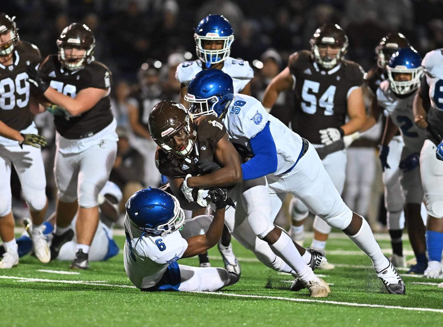 Joliet Catholic's Justin Bonsu (11) runs the ball during IHSA Class 4A first round playoff on Friday, Oct. 28, 2022, at Joliet. (Dean Reid for Shaw Media)