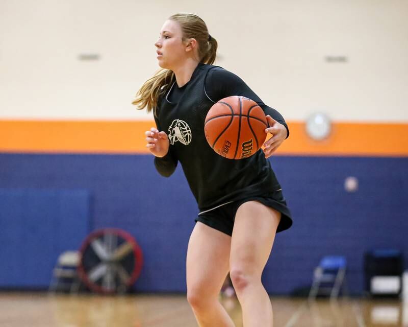 Kaneland's Kendra Brown looks over the defense at the Oswego Girls Basketball Shootout . June 30, 2023.