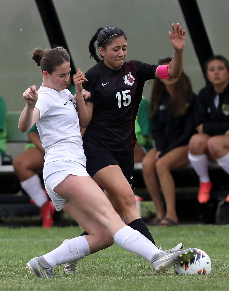 Crystal Lake South's Tessa Melhuish kicks the ball away from Prairie Ridge's Marissa Lemus during a Class 2A Crystal Lake Central Regional girls soccer semifinal match on Tuesday, May 19, 2026, at Crystal Lake Central High School.
