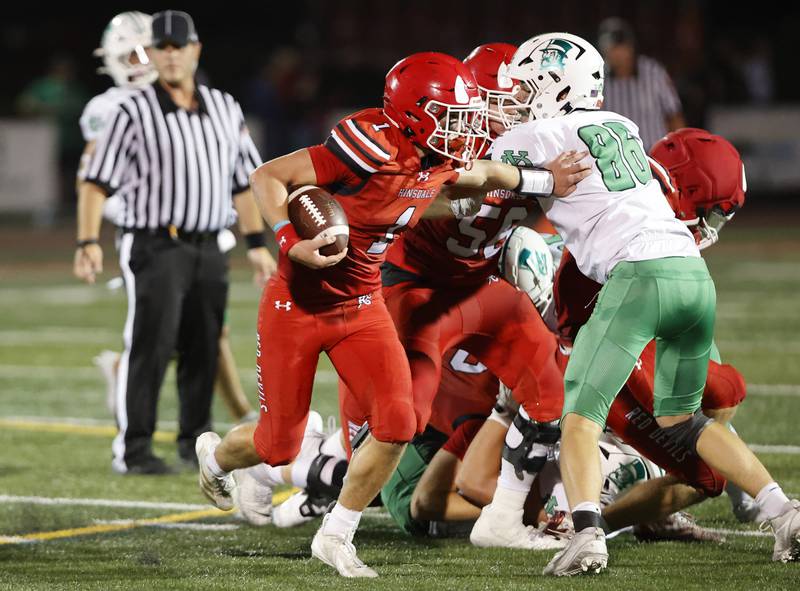 Hinsdale Central's Riley Contreras (1) tries to get past the defense during the varsity football game between York and Hinsdale Central on Friday, Oct. 3, 2025 in Hinsdale, IL.