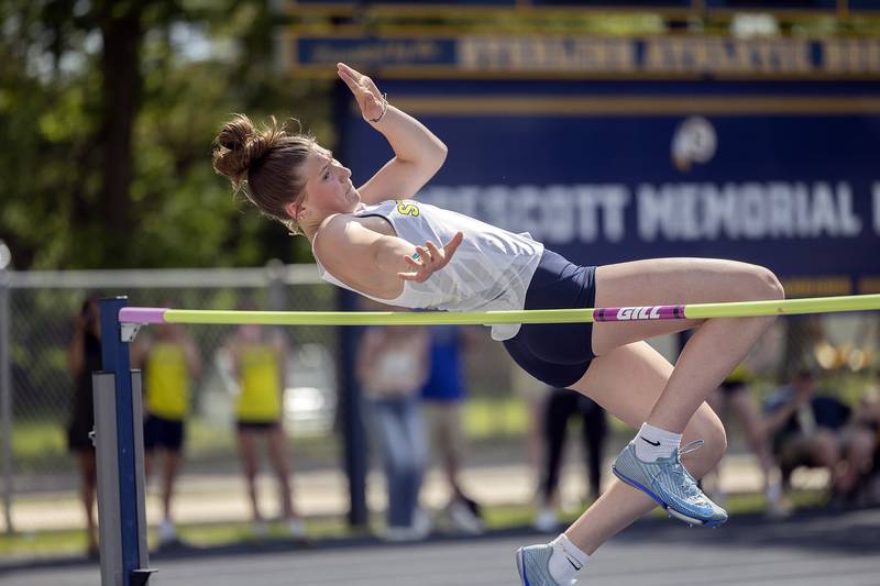 Sterling’s Kaelee Varden clears the bar in the high jump to qualify for state Wednesday, May 14, 2025, during Sectionals at Sterling High School.