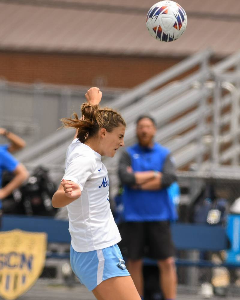 St. Charles North Hannah Lehmann (2) heads the ball in the first half of the regional title game Saturday May 27th  as they took on St. Charles East.