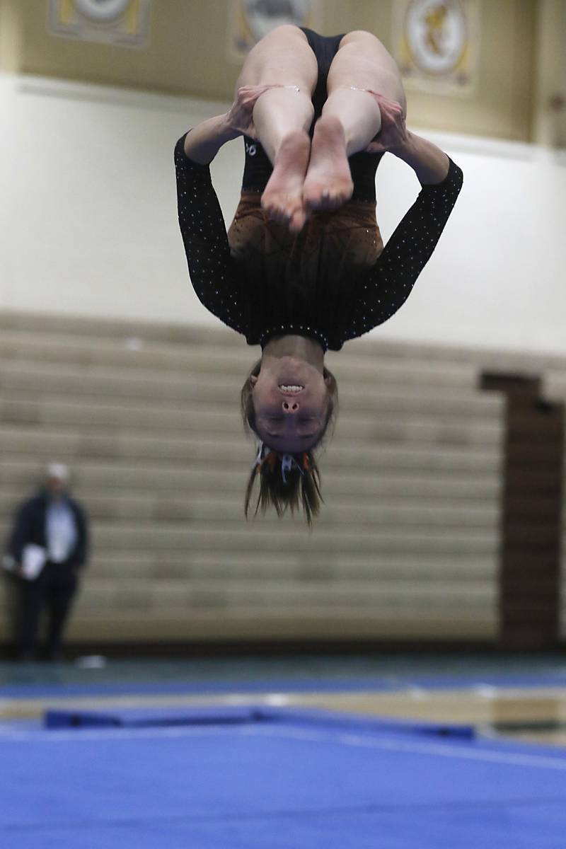 Libertyville’s Anna Becker competes in floor exercise  Wednesday, Feb. 8, 2023, during  the IHSA Stevenson Gymnastics Sectional at Stevenson High School in Lincolnshire.