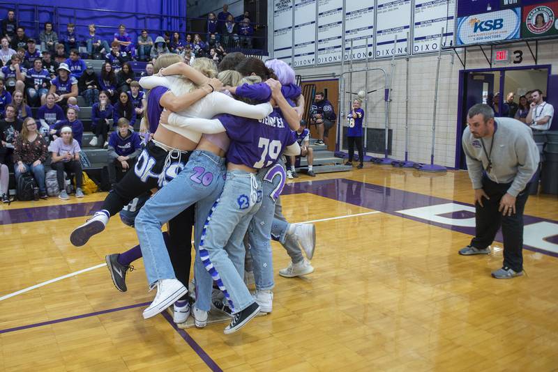 The Dixon High School senior class work together to win the “pack the plywood” game Friday, Sept. 30, 2022 in during the school’s homecoming pep rally.