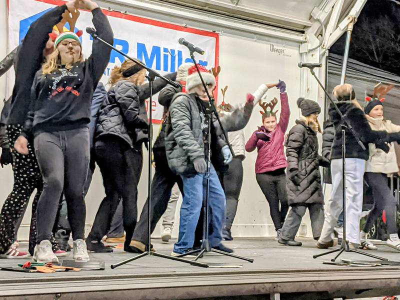 The Traughber Junior High School Chorus performs at the Oswego Christmas Walk on Friday, Dec. 5, 2025.