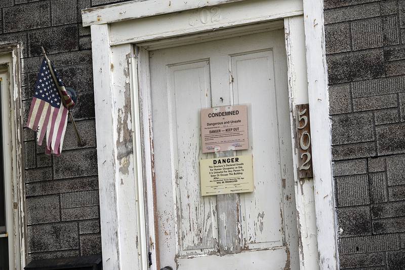 A condemned sign is seen Monday, June 9, 2025, on the front of a house located at 502 W. Seventh St. in Dixon.