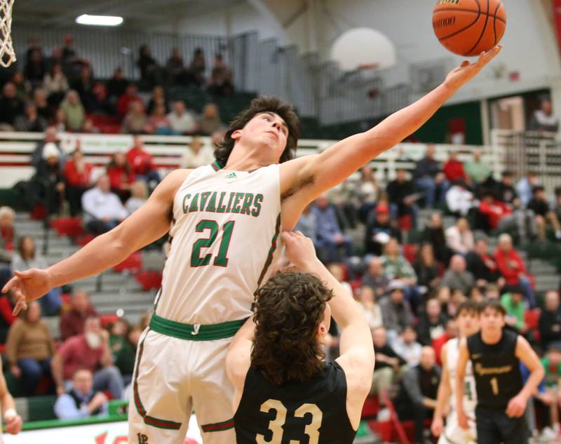 L-P's Josh Senica grabs a rebound over Sycamore's Carter York on Tuesday, Jan. 31, 2023 at L-P High School.