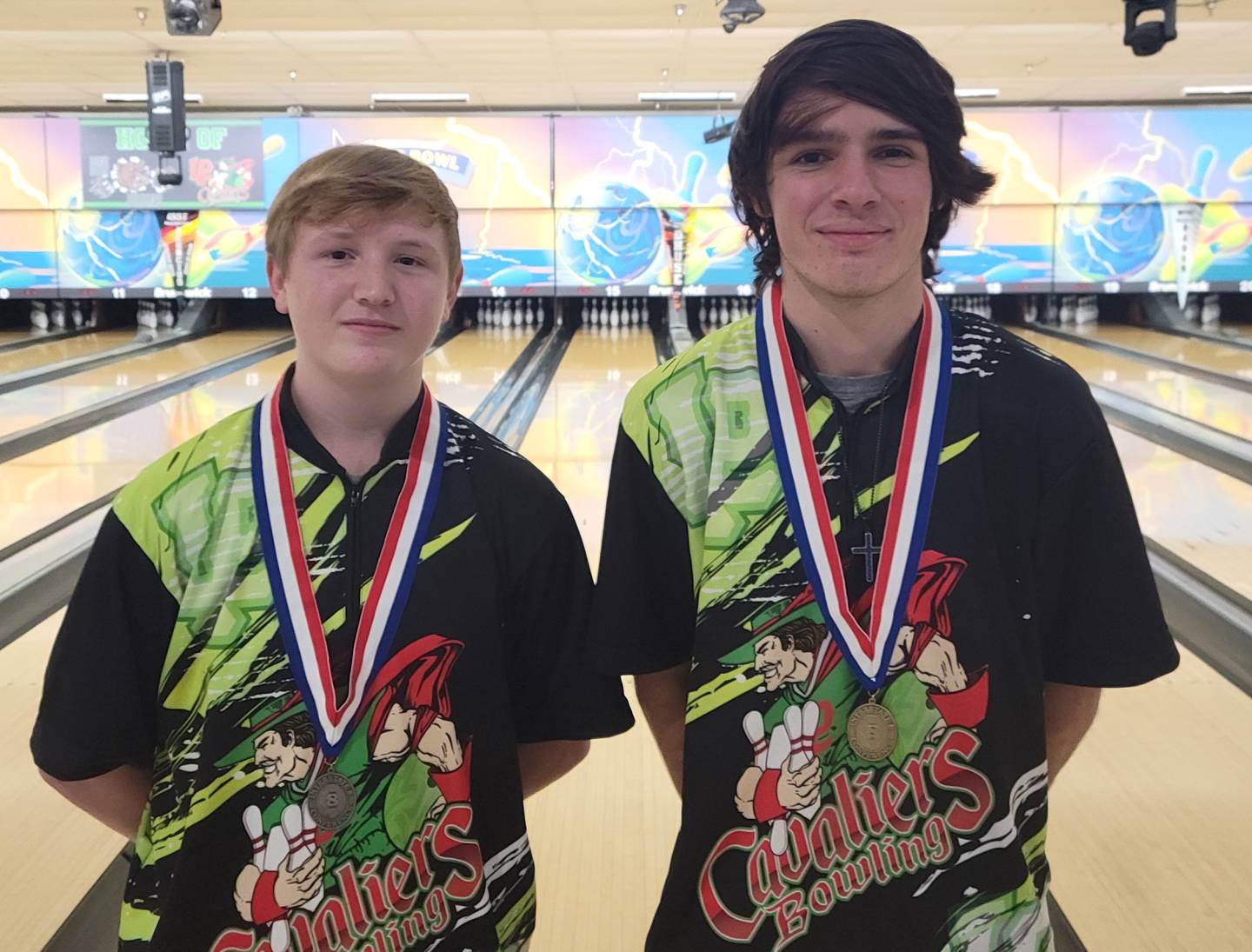 La Salle-Peru junior Ethan Picco (right) earned the individual championship at Tuesday's Interstate Eight Conference Boys Bowling meet at Illinois Valley Super Bowl in Peru, while classmate Chance Hank finished runner-up. The two led the Cavaliers to the team title over second-place Sycamore.