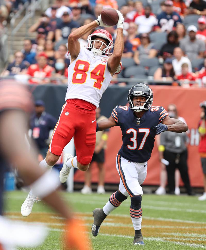 Kansas City Chiefs wide receiver Justin Watson catches a touchdown pass in front of Chicago Bears safety Elijah Hicks during their preseason game Sunday, Aug. 13, 2022, at Soldier Field in Chicago.
