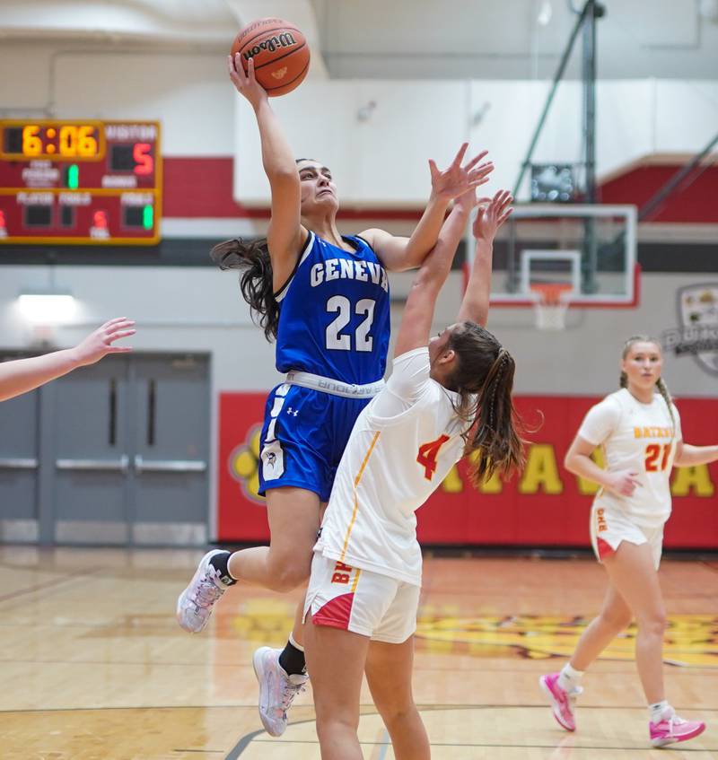Geneva’s Leah Palmer (22) shoots the ball in the paint over Batavia's Addi Lowe (4) during a basketball game at Batavia High School on Friday, Jan 26, 2024.