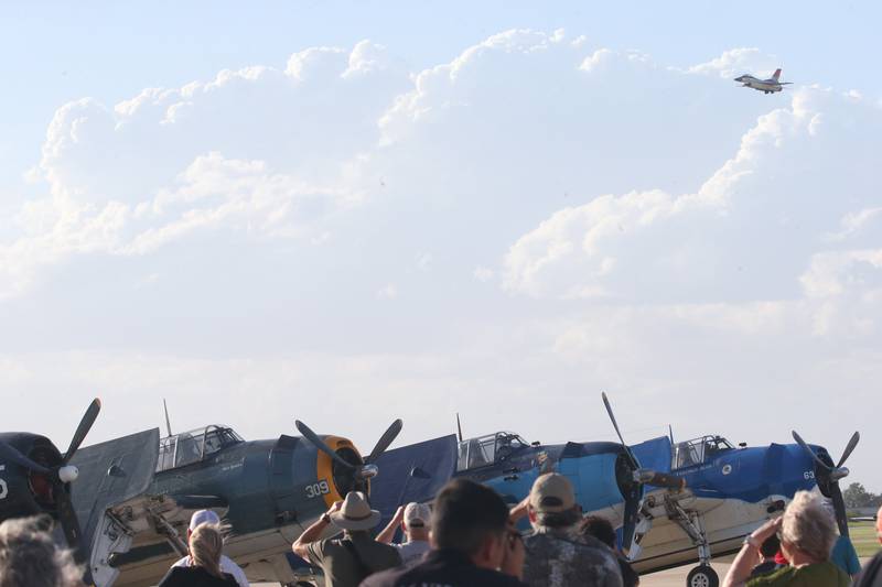 The Viper Demo Team F-16 flies over TBM aircrafts during the 10th annual TBM Avenger Reunion and Airshow on Friday, May 16, 2025 at the Illinois Valley Regional Airport in Peru.