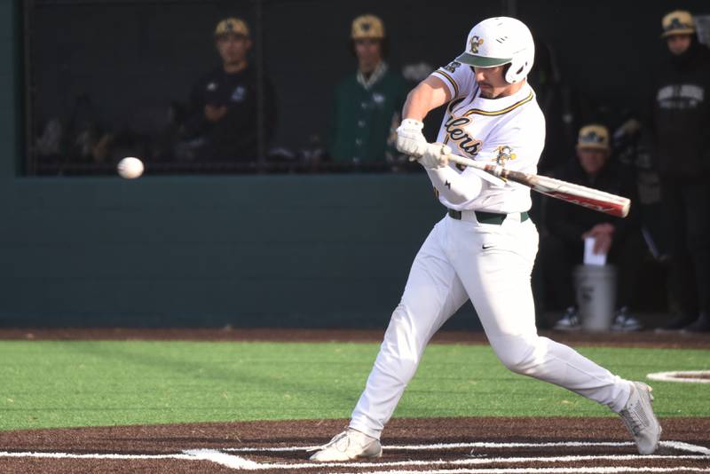 Coal City's Gabe McHugh swings at a pitch during a home game against Bishop McNamara Thursday, April 3, 2025.
