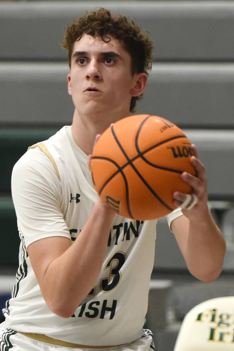 Bishop McNamara's Karter Krutsinger readies a shot during a home game against Lycee Francais de Chicago Wednesday, Feb. 18, 2026.