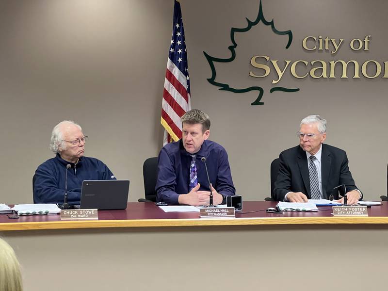 Sycamore City Manager Michael Hall speaks to the Sycamore City Council on Dec. 15, 2025, as 2nd Ward Alderman Chuck Stowe and City Attorney Keith Foster listen.