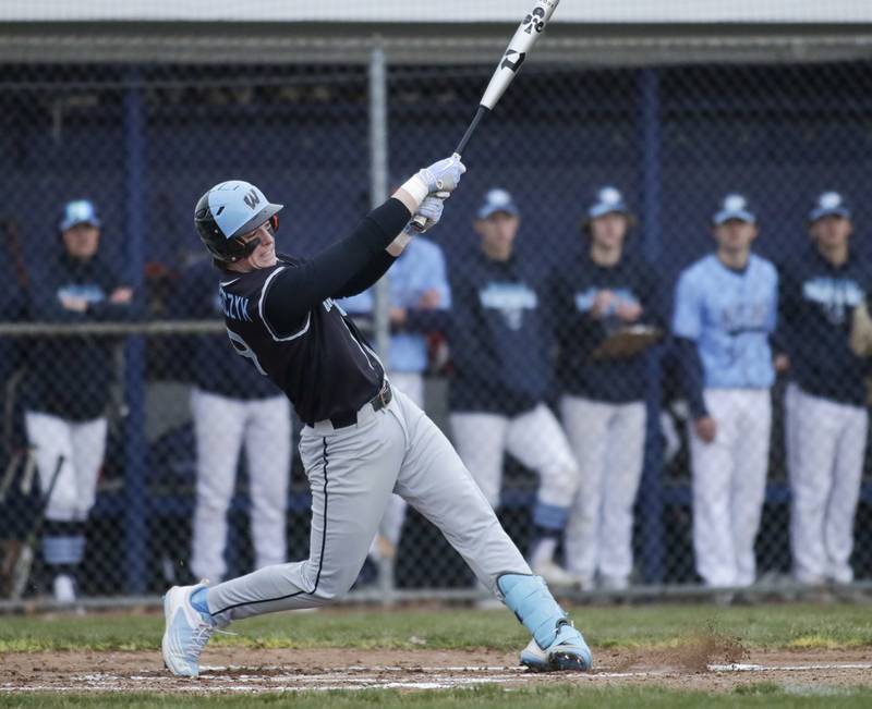 Willowbrook’s Isaac Sobieszczyk (9) connects for a double against Downers Grove South during a game in Downers Grove on Tuesday, April 5, 2022.