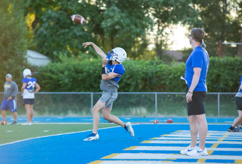 Quarterback Tyler O'Connor throws the ball during practice at Wheaton North on Thursday, Aug. 11, 2022.