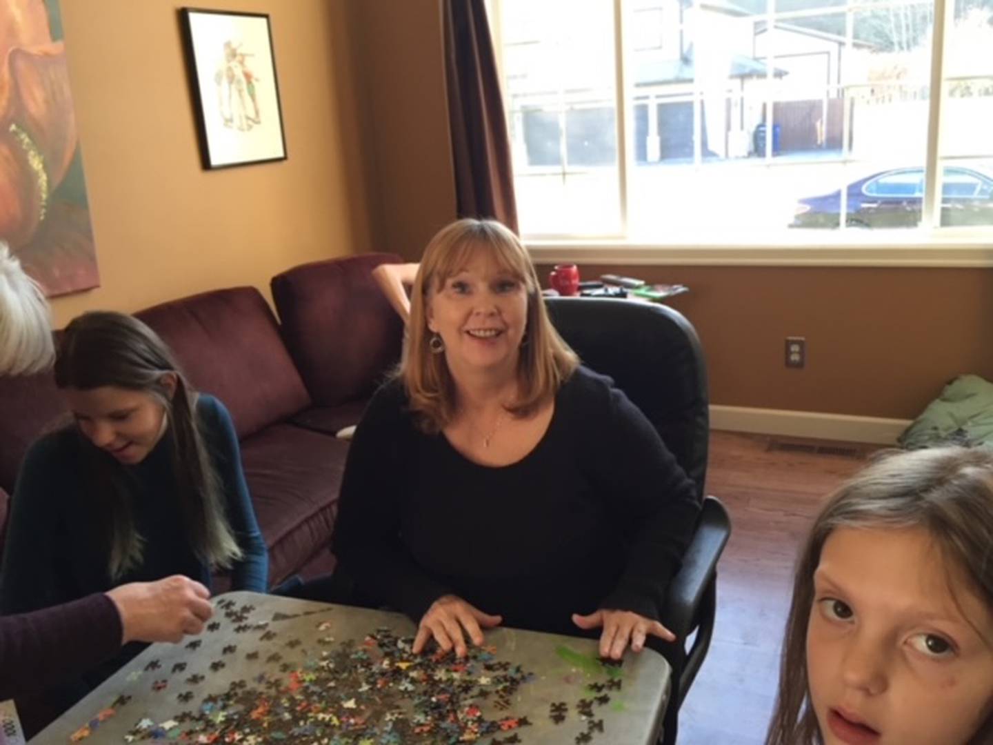 To the reading world, Joliet native Sandy (Adam) Kleinschmit was known as Sandra James and Samantha James, author of 37 romance novels for such publishers as Harlequin and HarperCollins. But she was also a down-to-earth woman who put family first. She is pictured with her granddaughters Ashley and Kait.