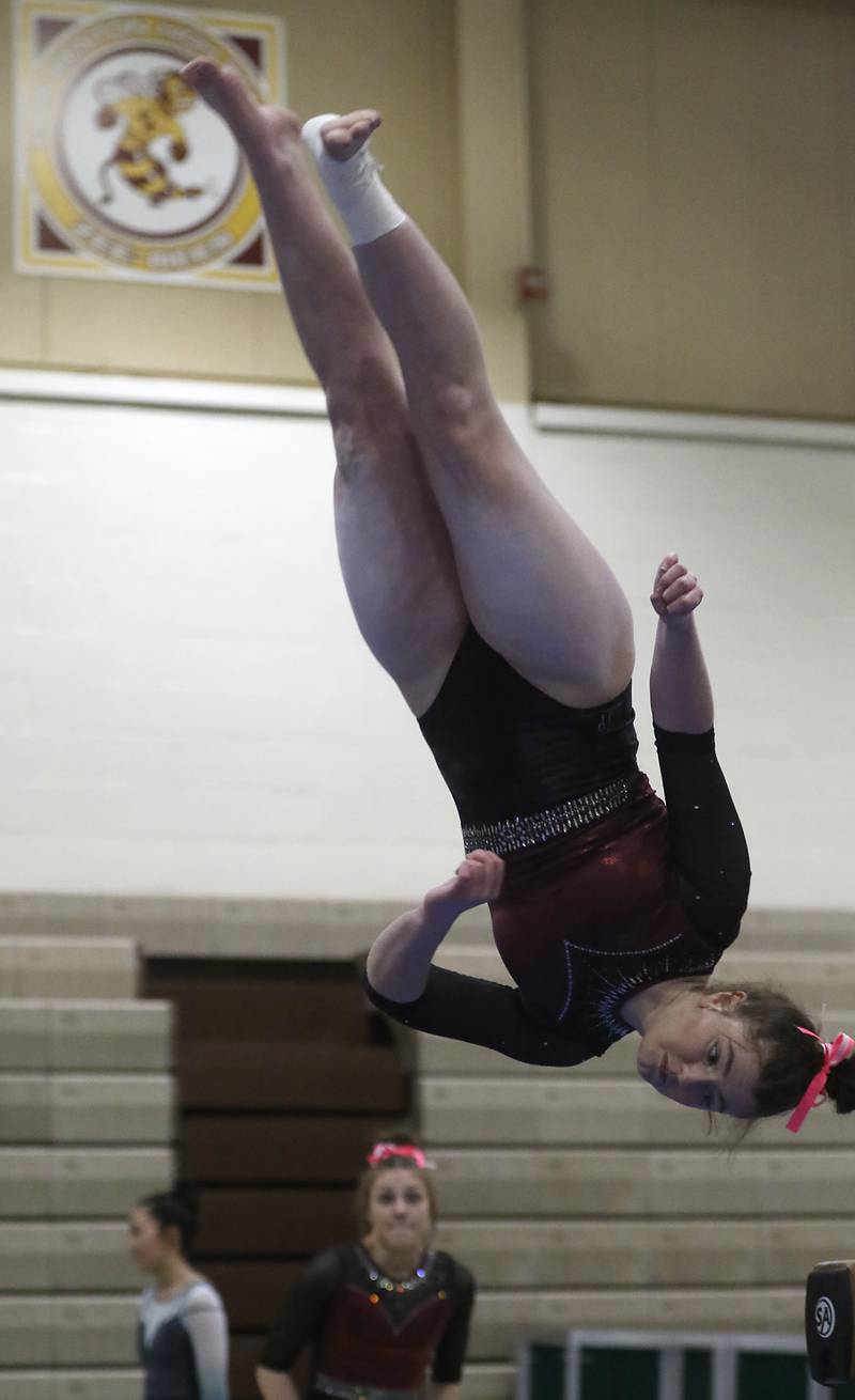 Prairie Ridge’s Delaney Wolfe competes on the balance beam Wednesday, Feb. 8, 2023, during  the IHSA Stevenson Gymnastics Sectional at Stevenson High School in Lincolnshire.
