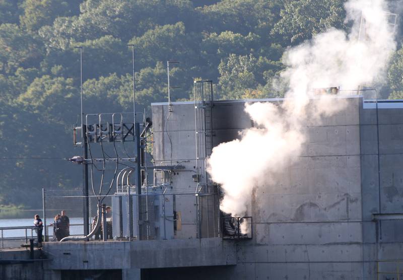 Smoke billows from the Starved Rock hydroelectric power plant at the Starved Rock Lock and Dam on Tuesday, Oct. 3, 2023 near Utica. A MABAS box alarm was sent out just before 730a.m. for a working fire inside the plant.