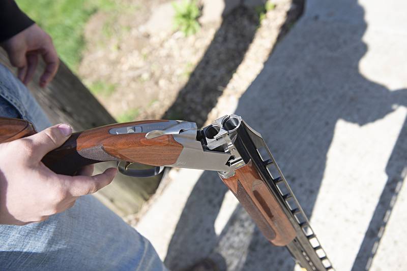 Skromme opens up the breech on his over/under 12 gauge.
