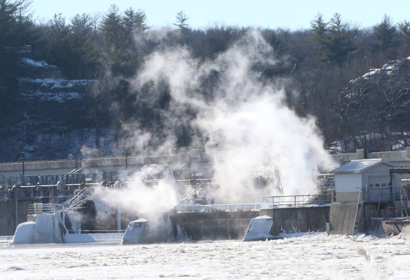 Steam emerges from the Illinois River at the Starved Rock Lock and Dam on Tuesday, Jan. 16, 2024.