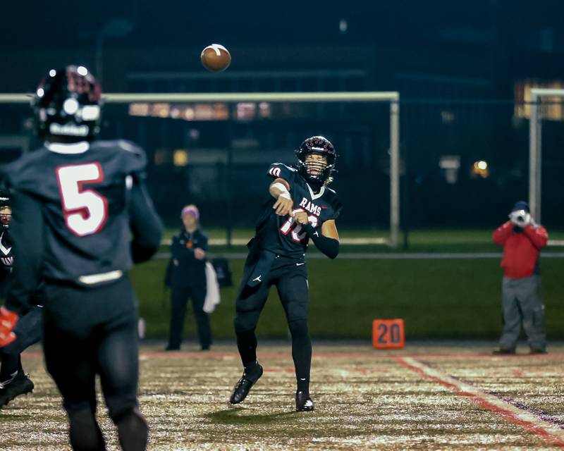 Glenbard East's Blake Salvino (10) passes during football game between Glenbard South at Glenbard East.   Oct 13, 2023.