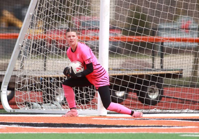 Burlington Central goal keeper Kenzie Lorkowski makes a save during a game on Tuesday, April 1, 2025 against St. Charles East in St. Charles.