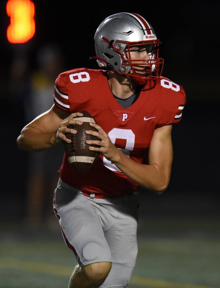 Palatine quarterback Grant Dersnah carries the ball for a touchdown during Thursday's game against Glenbrook South.